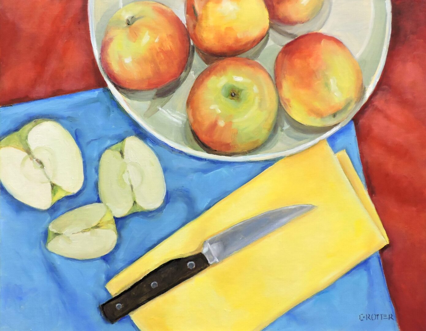 A view of apples, a knife, and a cutting board